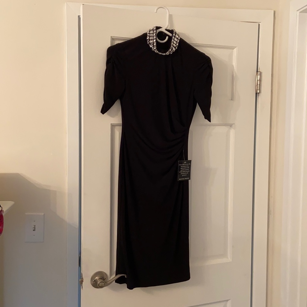 Black sleeve dress with rhinestone neckline